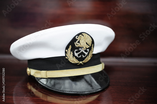Mexican Navy officer's cap on a wooden surface