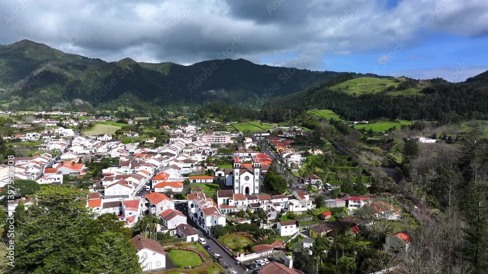Igreja de Nossa Senhora da Alegria parish church in Furnas. Aerial establisher