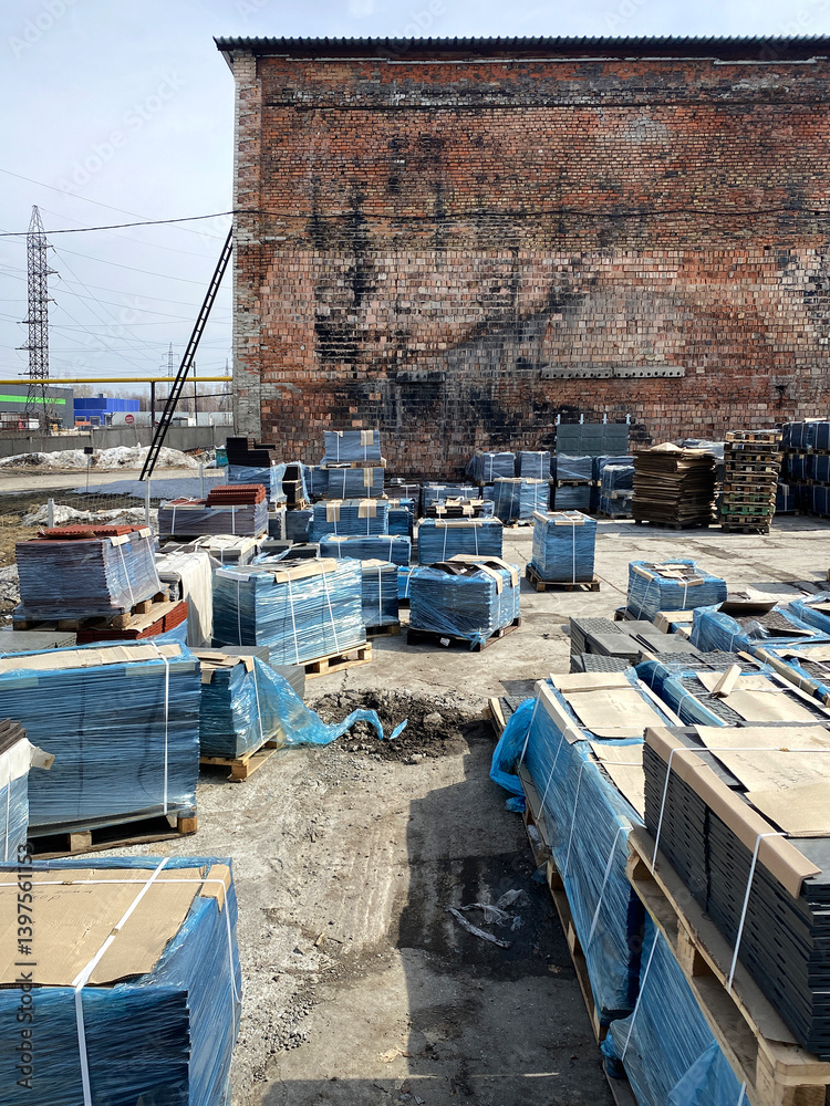 Fototapeta premium Paving slabs, shop, paving slabs warehouse. Different paving slabs vertical photo