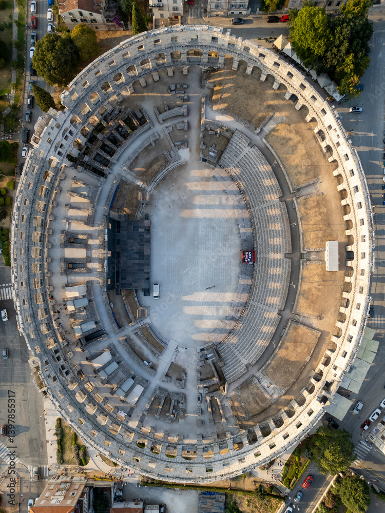 Aerial view of the ancient Roman amphitheater arena in the historic city of Pula, Istria, Croatia. Aerial view of the ancient Roman amphitheater arena in the historic city of Pula, Istria, Croatia.