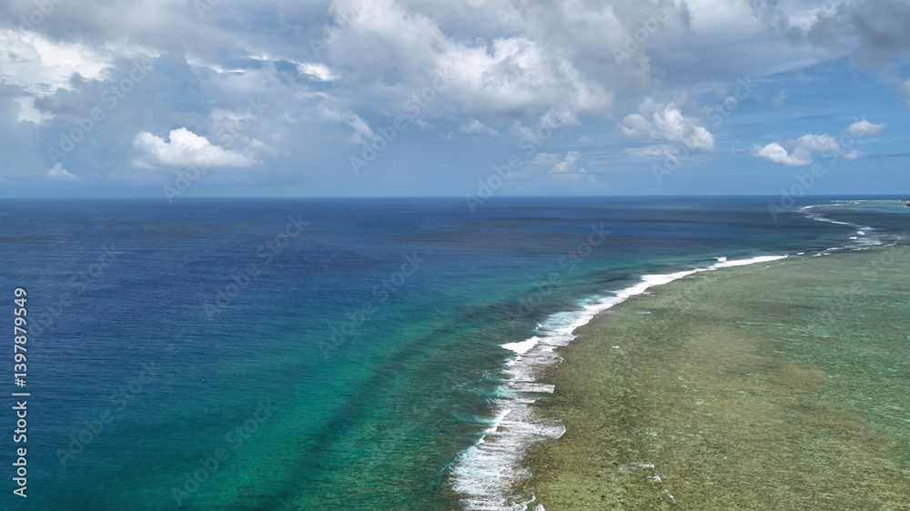 Aerial view of tropical reef and serene ocean with turquoise water and beautiful coastline, Avarua, Rarotonga, Cook Islands. Aerial view of tropical reef and serene ocean with turquoise water and beautiful coastline, Avarua, Rarotonga, Cook Islands.