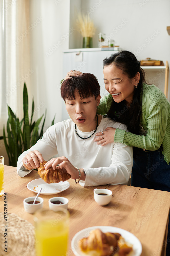 Young couple enjoying breakfast at home, sharing joyful moments in a cozy space Young couple enjoying breakfast at home, sharing joyful moments in a cozy space
