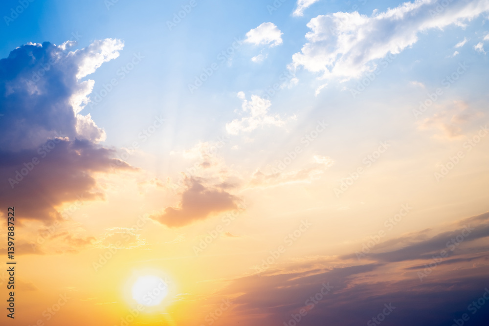Obraz premium Sky,sunset, beautiful , luxury soft gradient orange gold clouds and sunlight on the blue sky perfect for the background, Sunrise on morning or evening in winter warm time ,Twilight summer,silhouette