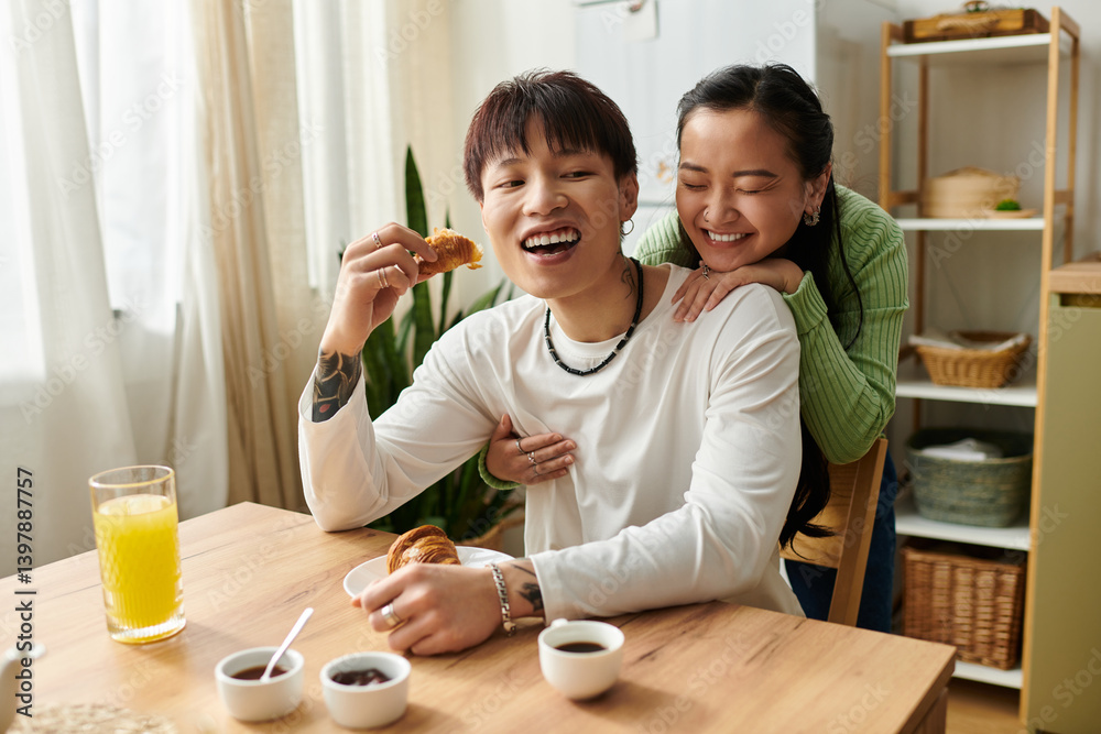 Joyful breakfast moments shared by a young asian couple in their cozy home Joyful breakfast moments shared by a young asian couple in their cozy home