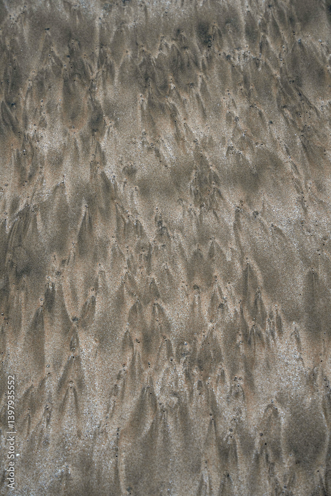Abstract background pattern of the sand on a tropical beach