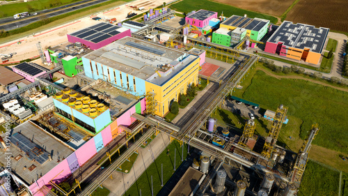 Obraz na płótnie Aerial view of a large colorful factory. The warehouses have walls of different colors. w salonie
