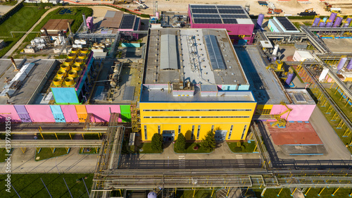 Obraz na płótnie Aerial view of a large colorful factory. The warehouses have walls of different colors. w salonie