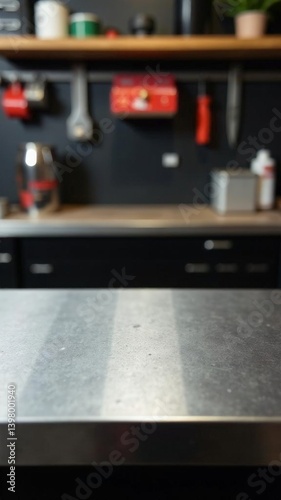 Empty metal surface on a blurred background of the garage or home workshop. empty metal workbench on the background of a storage Mock-up of a showcase for demonstrating products and tools. Copy space