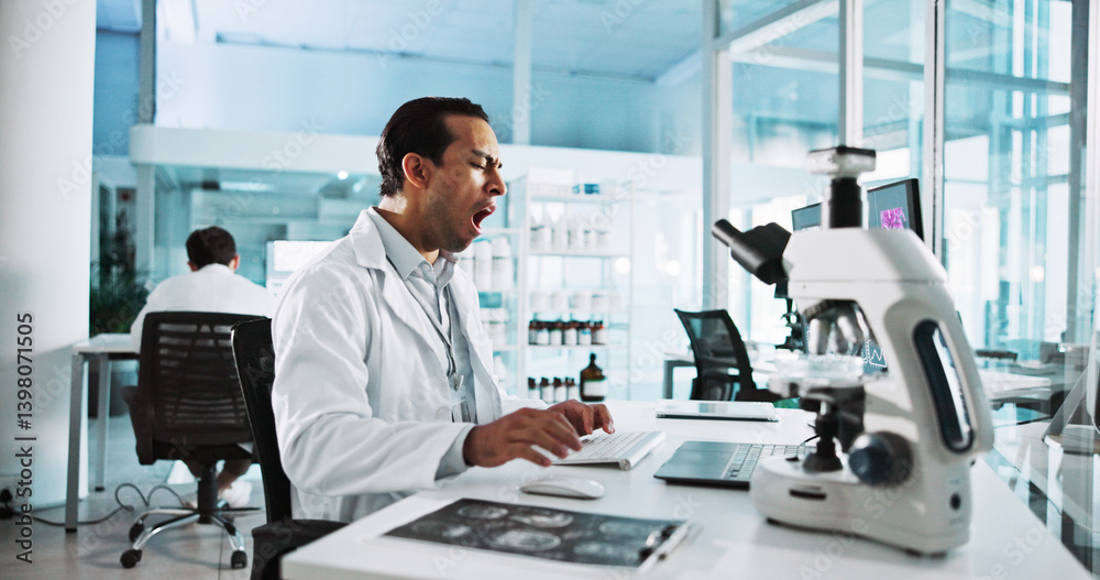 Laptop, science and tired with man in laboratory for healthcare, medical or pharmaceutical innovation. Computer, fatigue and microscope with scientist yawning in clinical trial for development Laptop, science and tired with man in laboratory for healthcare, medical or pharmaceutical innovation. Computer, fatigue and microscope with scientist yawning in clinical trial for development