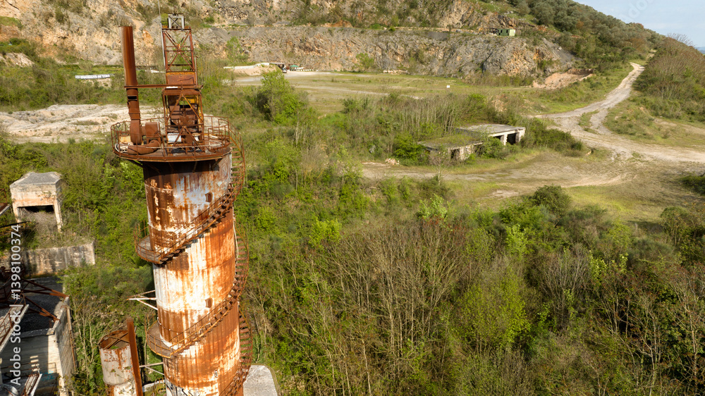 Interior of the tower of an abandoned and rusty factory.