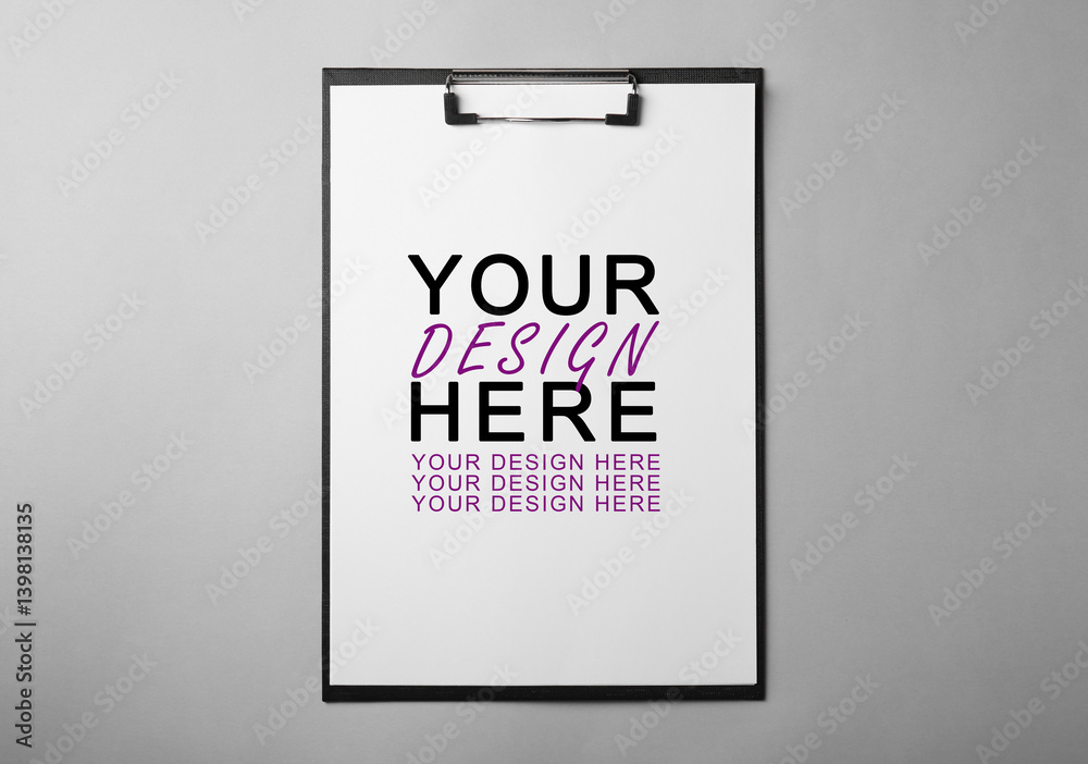 Clipboard with sheet of paper on grey background, top view. Mockup Your Design Here Clipboard with sheet of paper on grey background, top view. Mockup Your Design Here