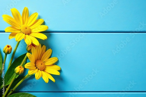 Yellow flowers placed on a blue wooden background, creating a simple and minimalist photography backdrop,  spring,  rustic