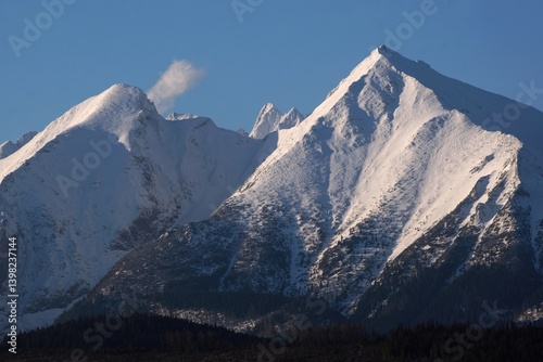 Obraz na płótnie The snow-capped peaks of the High Tatras mountains (Havran and Placliva Skala) from viewpoint Pass over Lapszanka (Pass over Łapszanka), Podhale, Poland w salonie