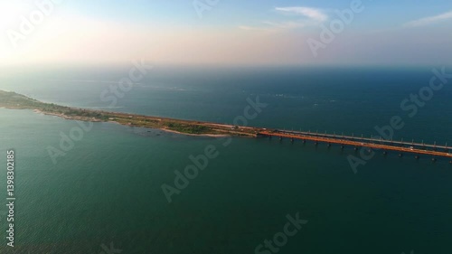 Wide drone view of Pamban Bridge Road over tranquil ocean waters