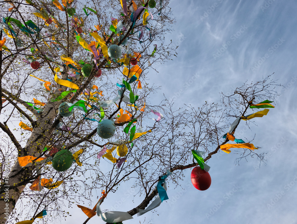 Easter tree decorated with colorful eggs and ribbons in prague