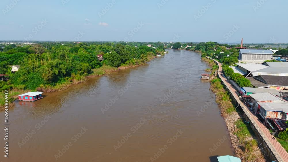 Several long-tail boats navigate the Mekong River near the border between Thailand Laos and Myanmar Several long-tail boats navigate the Mekong River near the border between Thailand Laos and Myanmar