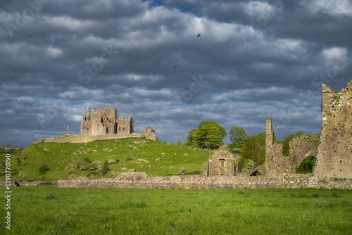 Obraz na płótnie Explore ancient ruins of Rock of Cashel and Hore Abbey nestled within vibrant landscape all under stunning sky that is perfect for both history lovers and nature enthusiasts alike, Tipperary, Ireland w salonie