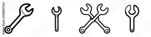Different types of wrenches arranged in a row, showcasing standard and adjustable designs for various mechanical tasks