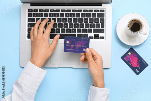 Woman with credit card and ...