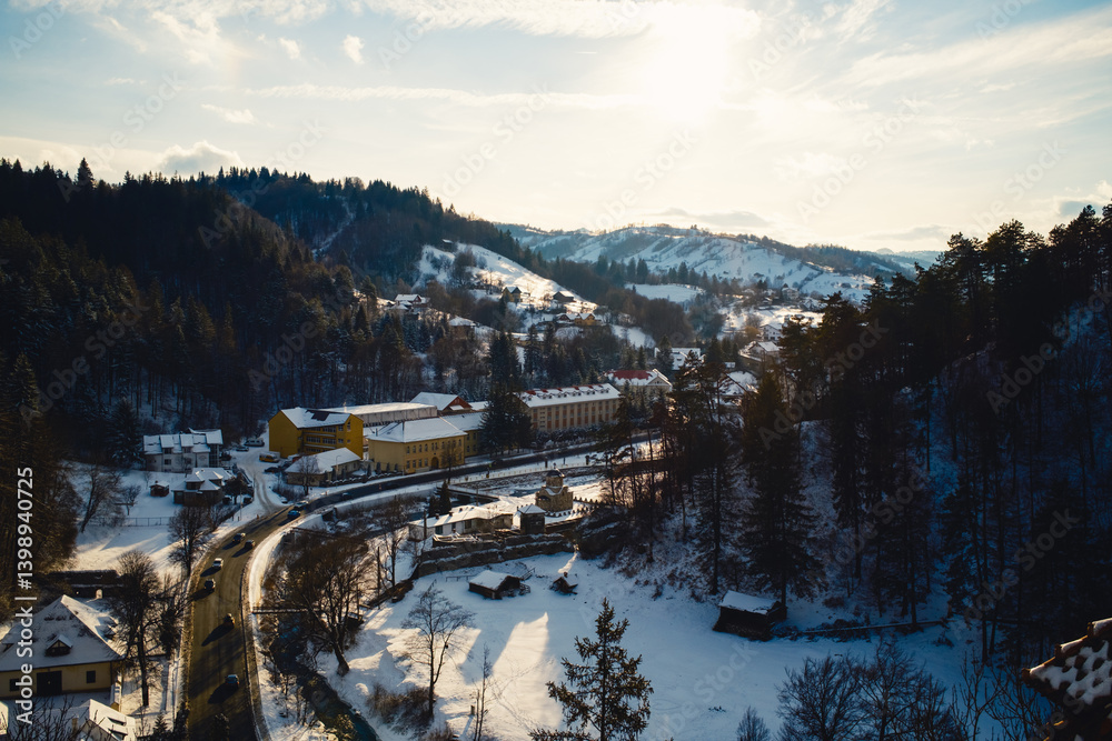 Street Passing Into The Snowy Romanian Forest