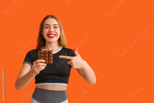 Happy young woman with choc...