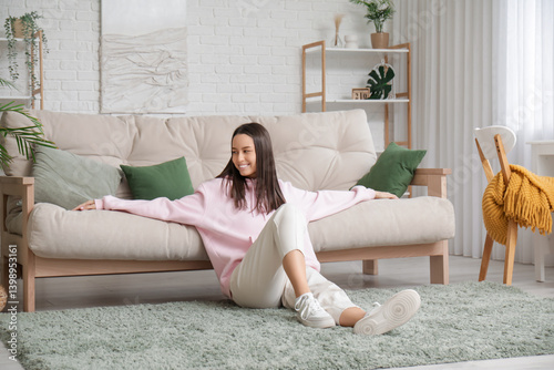 Young woman relaxing on flo...