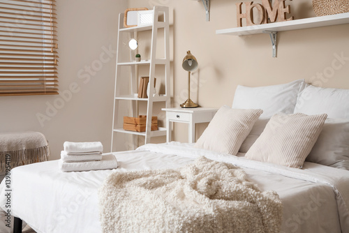Interior of bedroom with cl...