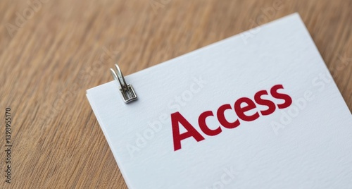 Red Access Word on White Paper Close Up View Wooden Background