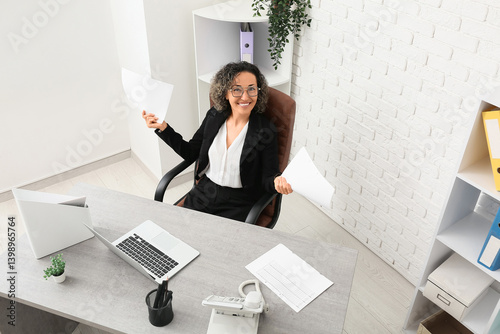 Happy mature businesswoman ...