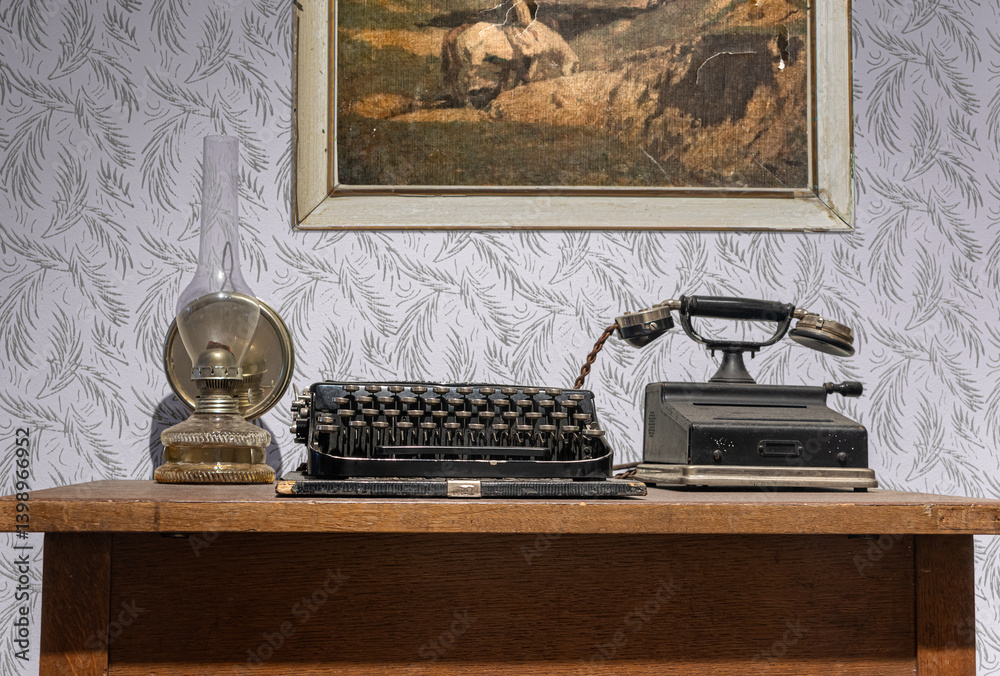 Old office desk with typewriter and telephone