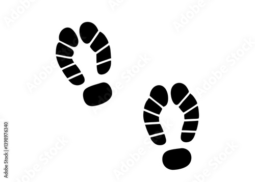 Footstep Trail Silhouette: This image depicts a stylized, graphic representation of two footprints, a clear black silhouette against a clean background, perfect for conceptual uses.