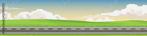 Banner background of  horizontal or lanscape view of asphalt road. Background is a flat grassland and hills with white clouds and a calm evening sky.