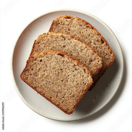 A top view of a plate of warm banana bread slices, isolated on a white background 