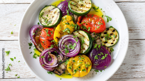 Grilled veggie salad with colorful vegetables, drizzled with olive oil and garnished with fresh herbs, offers vibrant and healthy dish