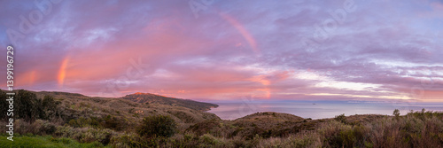 Obraz na płótnie Faint Rainbow Archs Over Santa Cruz Island In Channel Islands w salonie