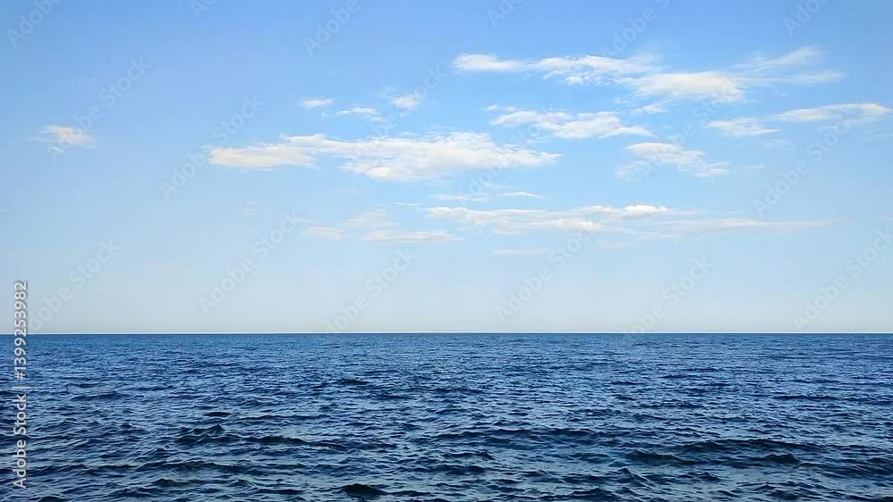 Sea view. Seascape. Sea landscape. Sea scenery. Blue sea surface, blue sky, skyline and white clouds. Calm windless weather. Nobody. Nature backdrop. Natural background. Sea view. Seascape. Sea landscape. Sea scenery. Blue sea surface, blue sky, skyline and white clouds. Calm windless weather. Nobody. Nature backdrop. Natural background.