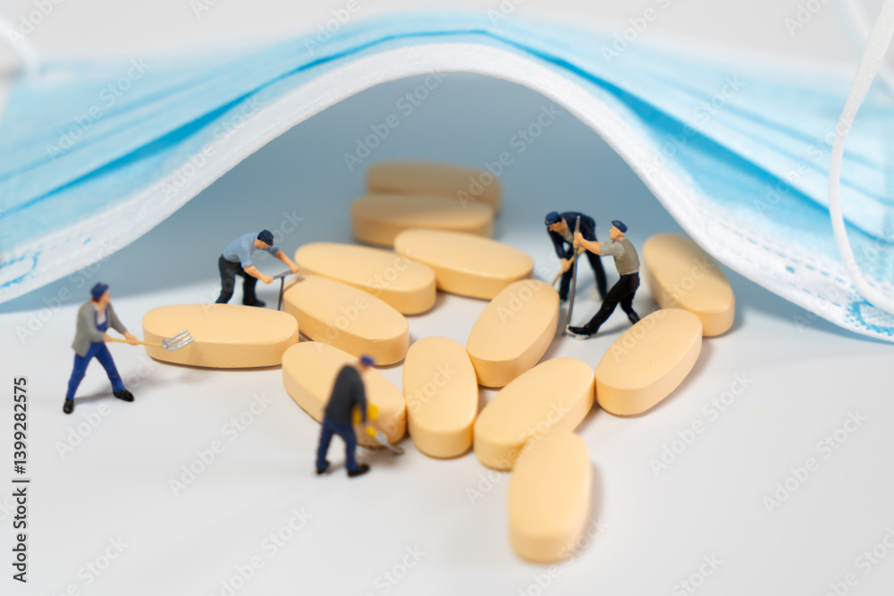 Miniature Workers Handling Pills Under a Medical Mask
