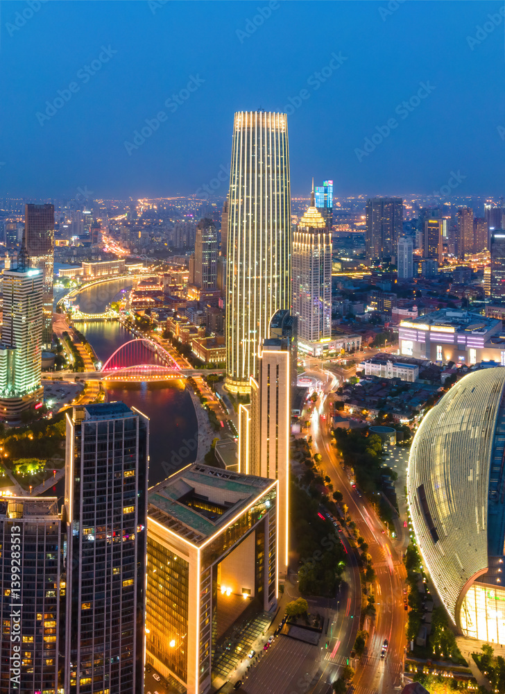 Stunning Aerial View of a Modern City Skyline at Night