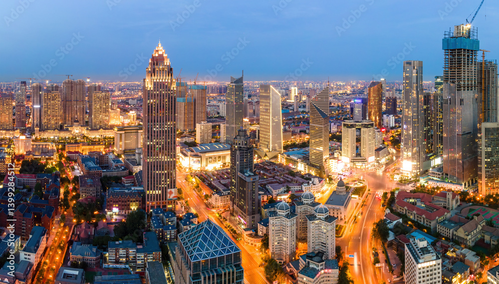 Stunning Aerial View of a Vibrant City Skyline at Dusk
