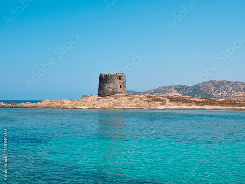 Torre della Pelosa and turquoise sea at La Pelosa Beach, Sardinia, Italy