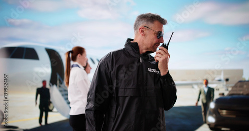 Obraz na płótnie Security Guard Protects High-level VIPs Near Private Jet w salonie