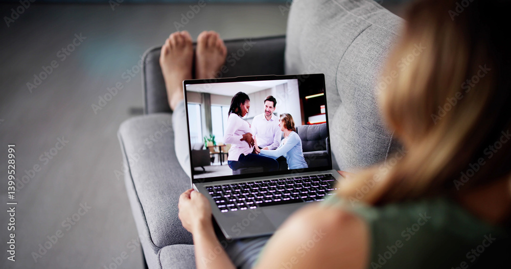 Young Woman Watching Video On Laptop