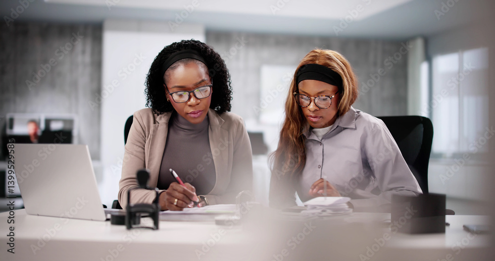 Smiling African-American Woman Working as an Advisory Accountant