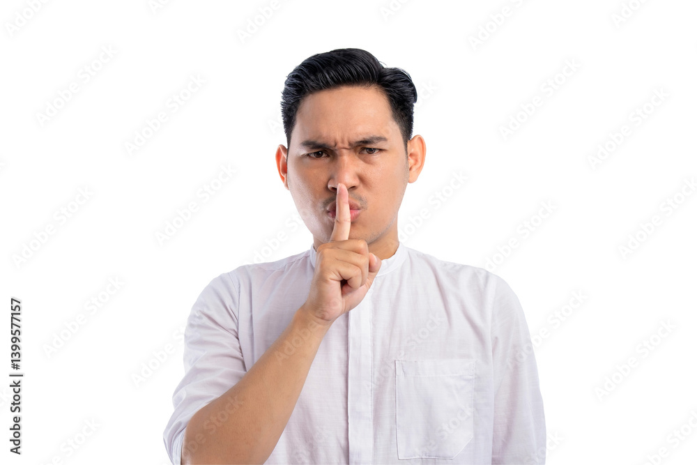 Handsome Asian Muslim man keeping a secret or asking for silence isolated on transparent background Handsome Asian Muslim man keeping a secret or asking for silence isolated on transparent background