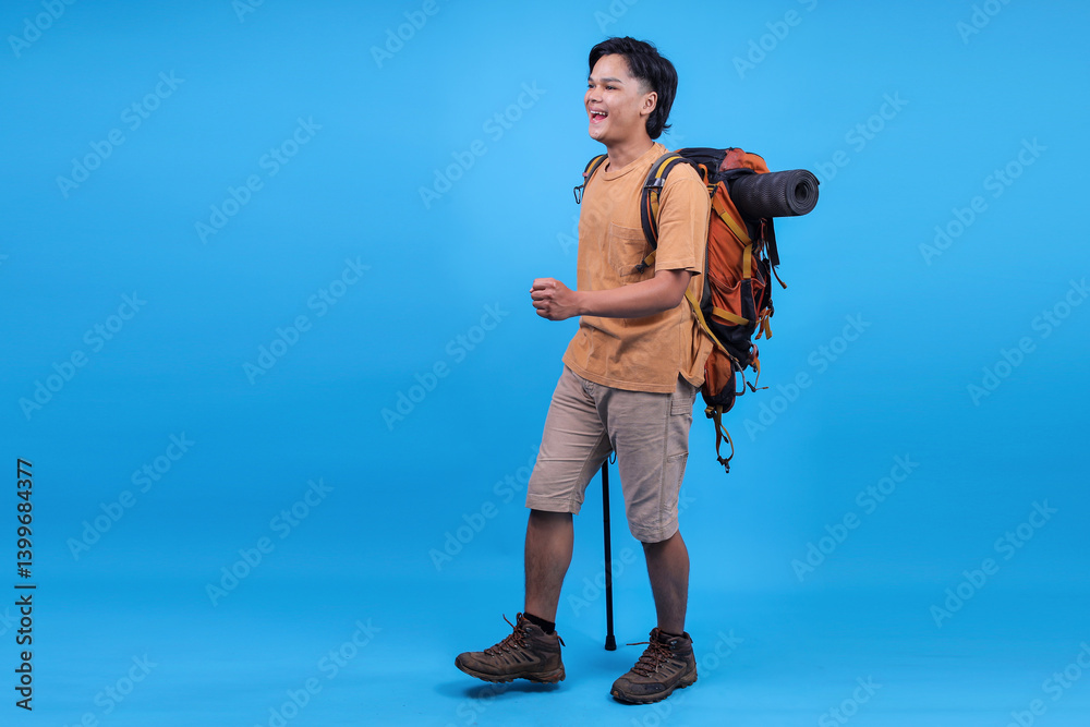 Obraz premium Full Body Side View Young Traveler Male Carry Backpack Stuff Mat Walk With Trekking Pole