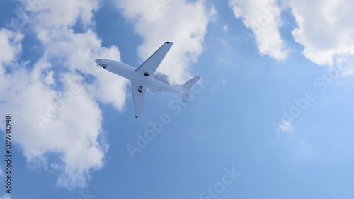 The plane is flying in the clouds