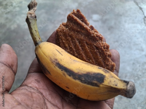 a plat of guava, banana and Thekua. It's commonly offered as prasad during the Chhath Puja festival in Bihar and other regions of India photo