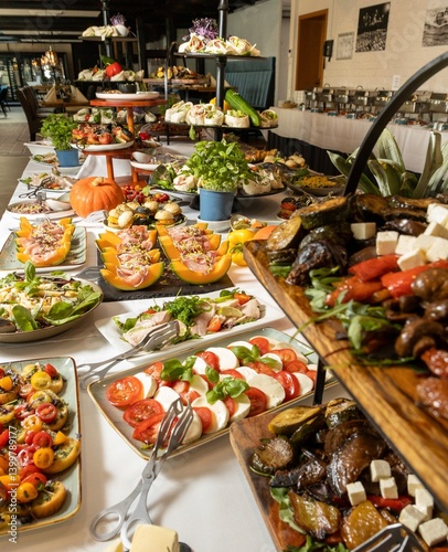 Buffet table with assorted appetizers and finger foods.