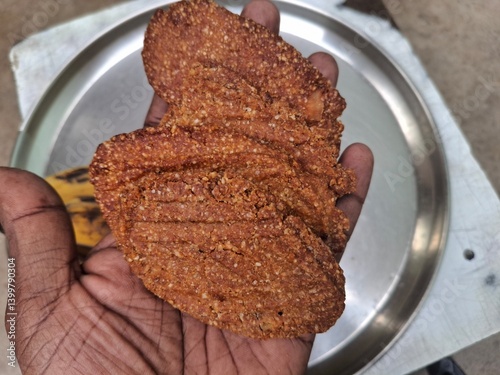 a plat of guava, banana and Thekua. It's commonly offered as prasad during the Chhath Puja festival in Bihar and other regions of India photo