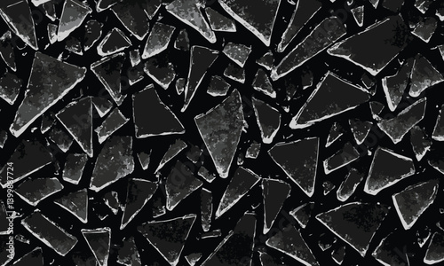 Dark abstract pattern of scattered black broken glass shards with a rough, edgy texture and high contrast lighting on a seamless background.